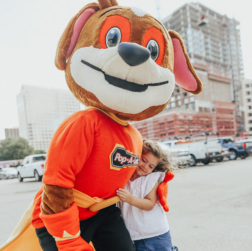 Pop-A-Lock mascot hugging child. We will take care of you!